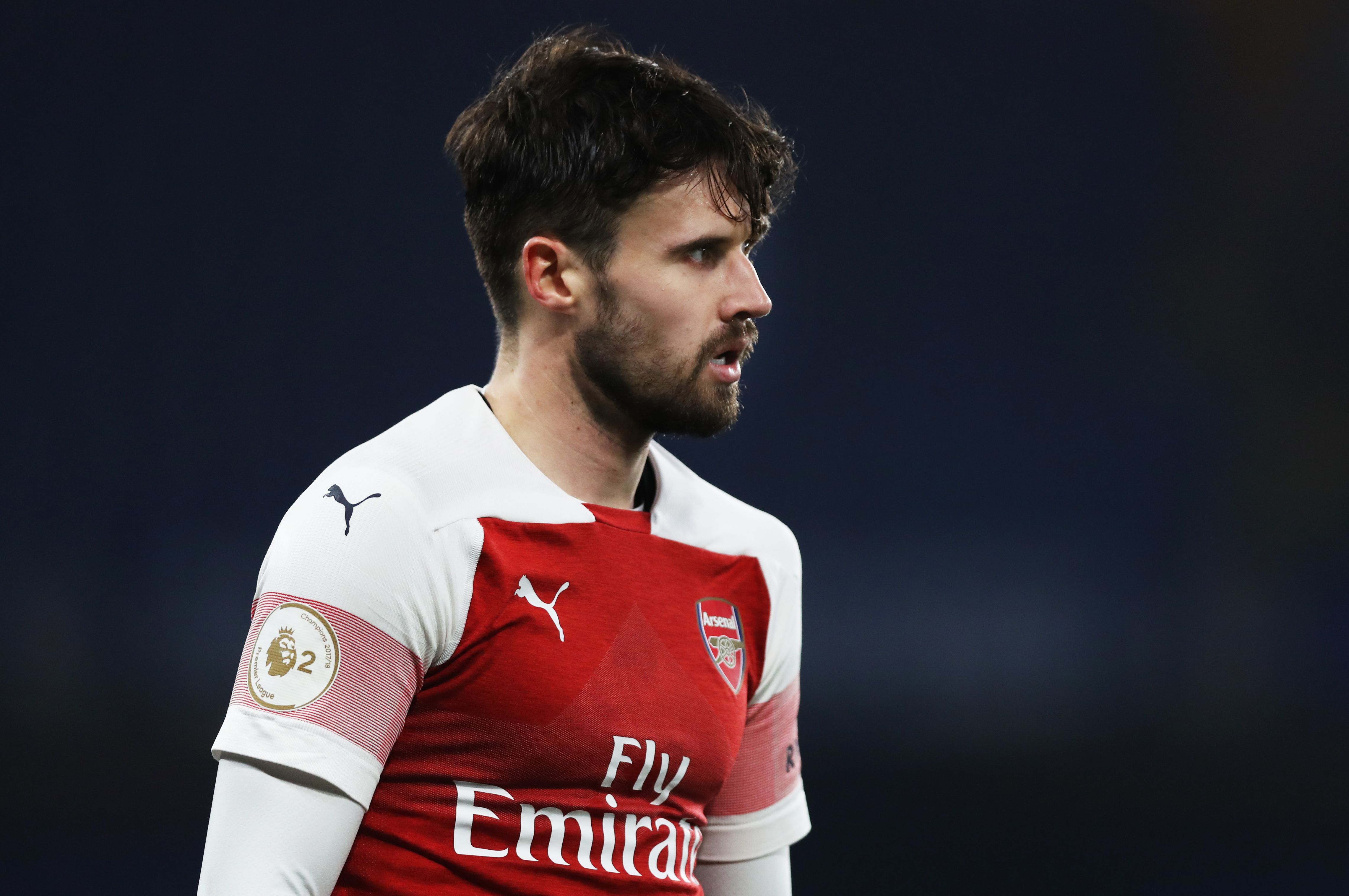 Ex-Arsenal star pens heartfelt message after being rushed to hospital with horror injury and admits 'it will be a while' until he can return to action