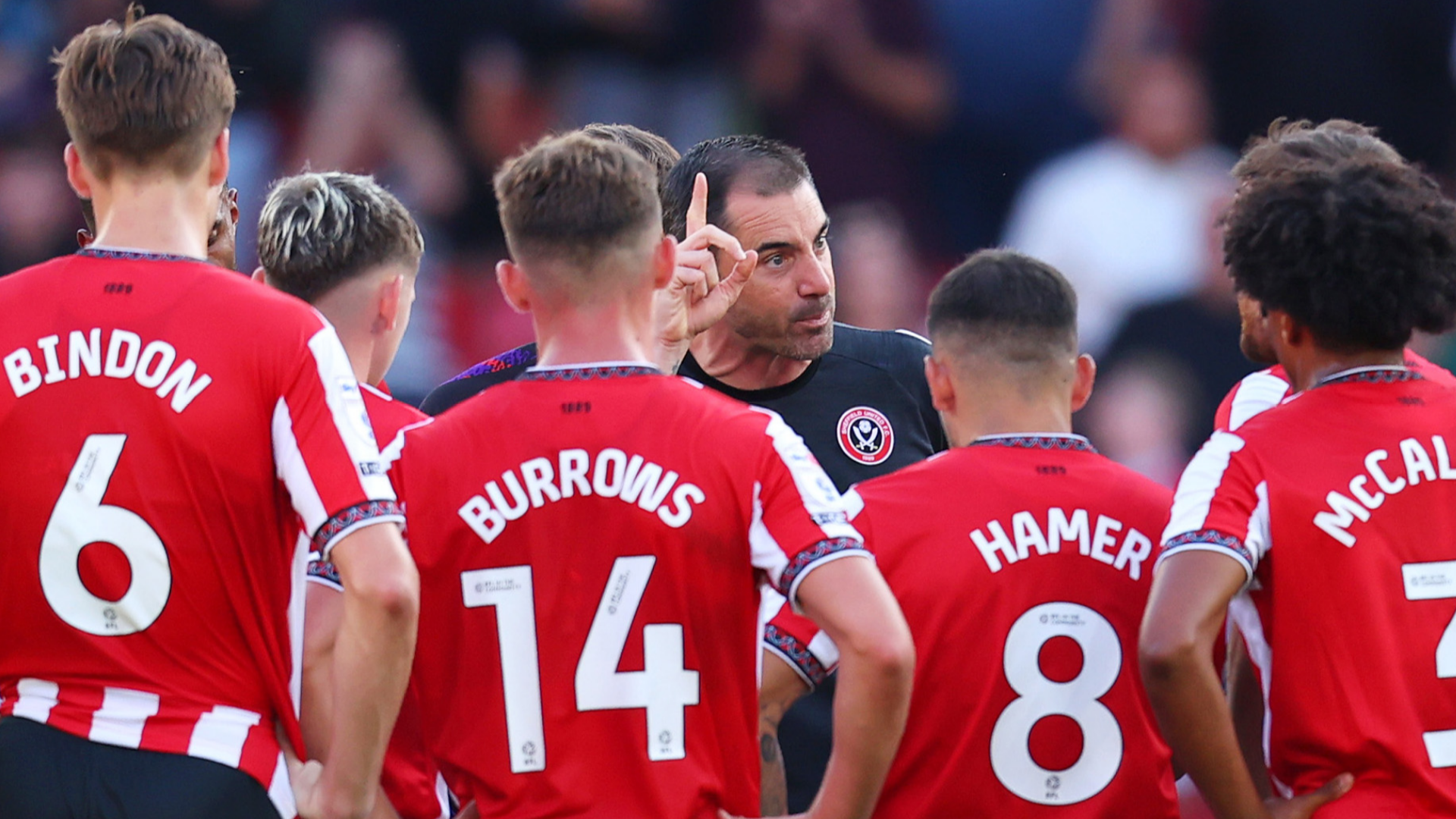 Former Premier League boss conducts post-match team talk on the pitch after thumping defeat in opening round of Championship fixtures