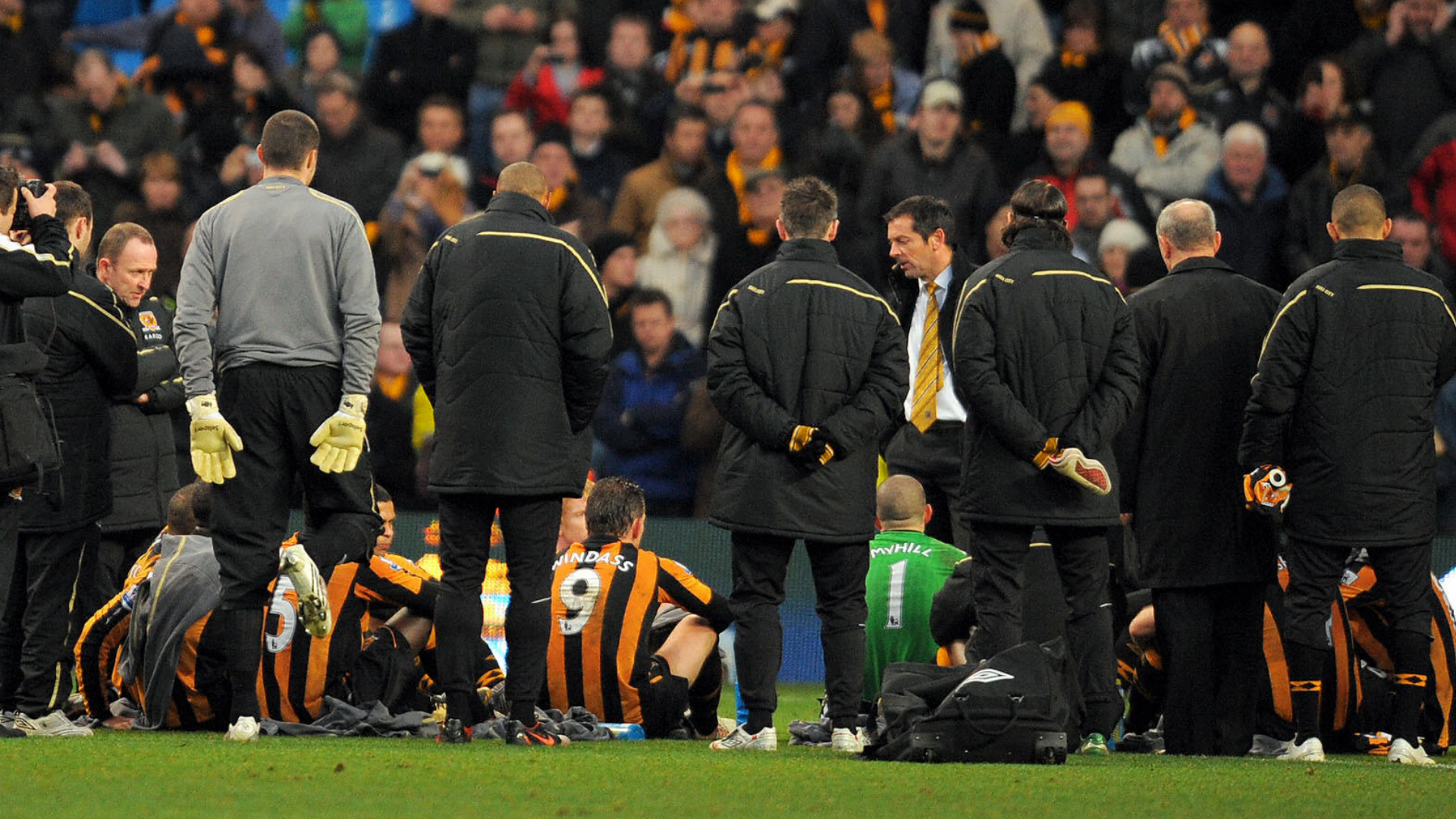 Former Premier League boss conducts post-match team talk on the pitch after thumping defeat in opening round of Championship fixtures