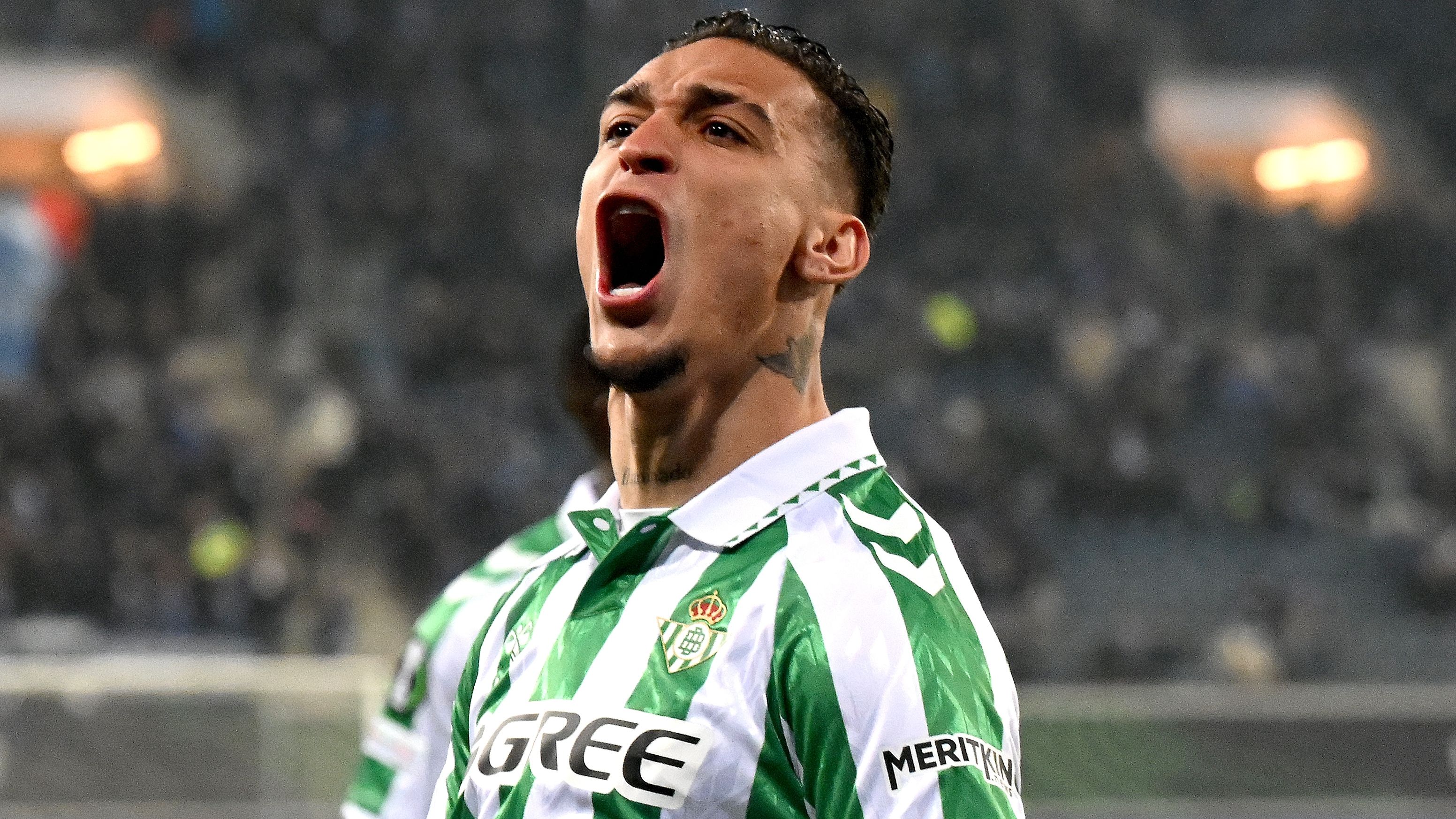 'The GOAT is back!' - Antony swarmed by Betis fans as he hangs out of car window after finally ending Man Utd transfer saga on deadline day