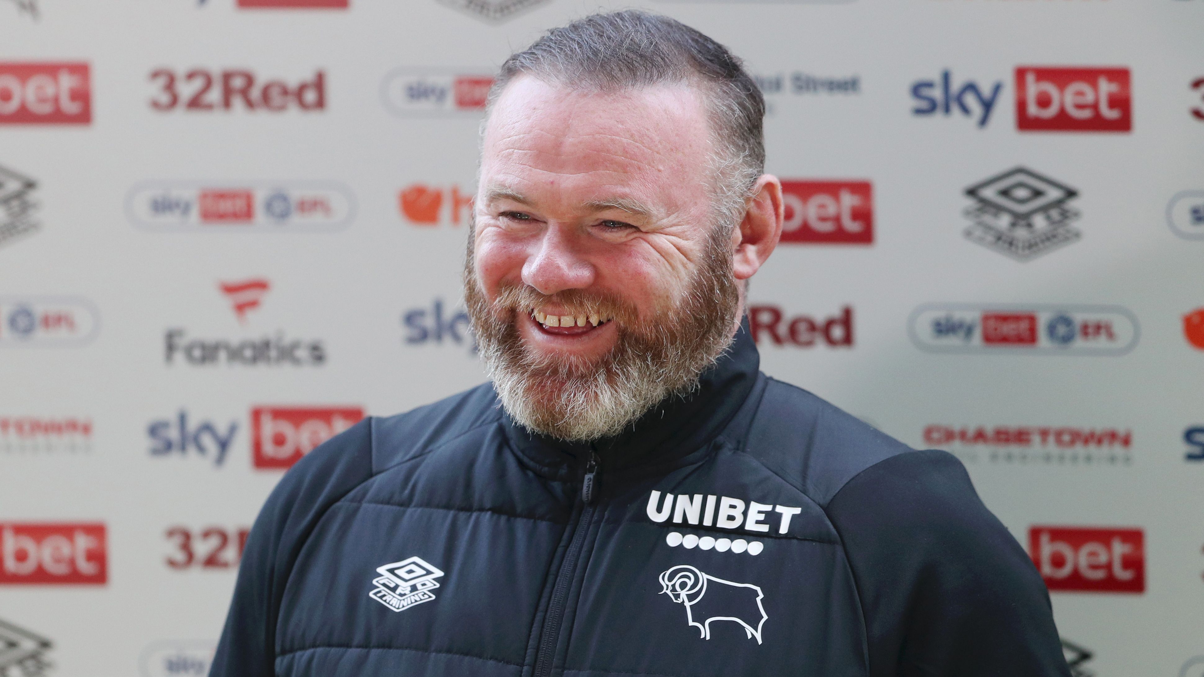'What am I doing?' - Wayne Rooney reveals water park meeting with transfer target in Championship job that saw Man Utd legend get stuck in 'skintight top'