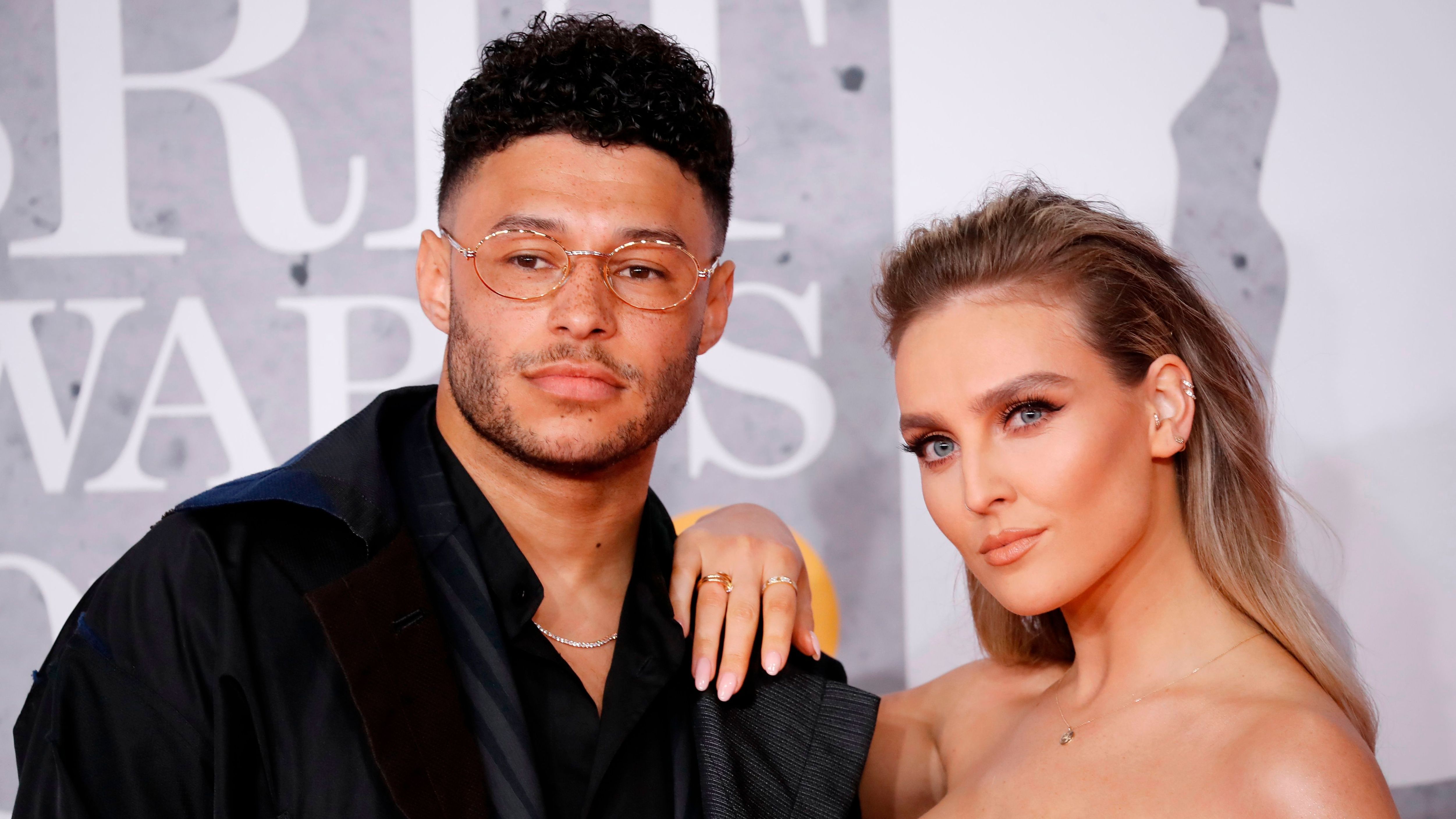 Alex Oxlade-Chamberlain and fiancee Perrie Edwards expecting second child as Little Mix star shows off baby bump