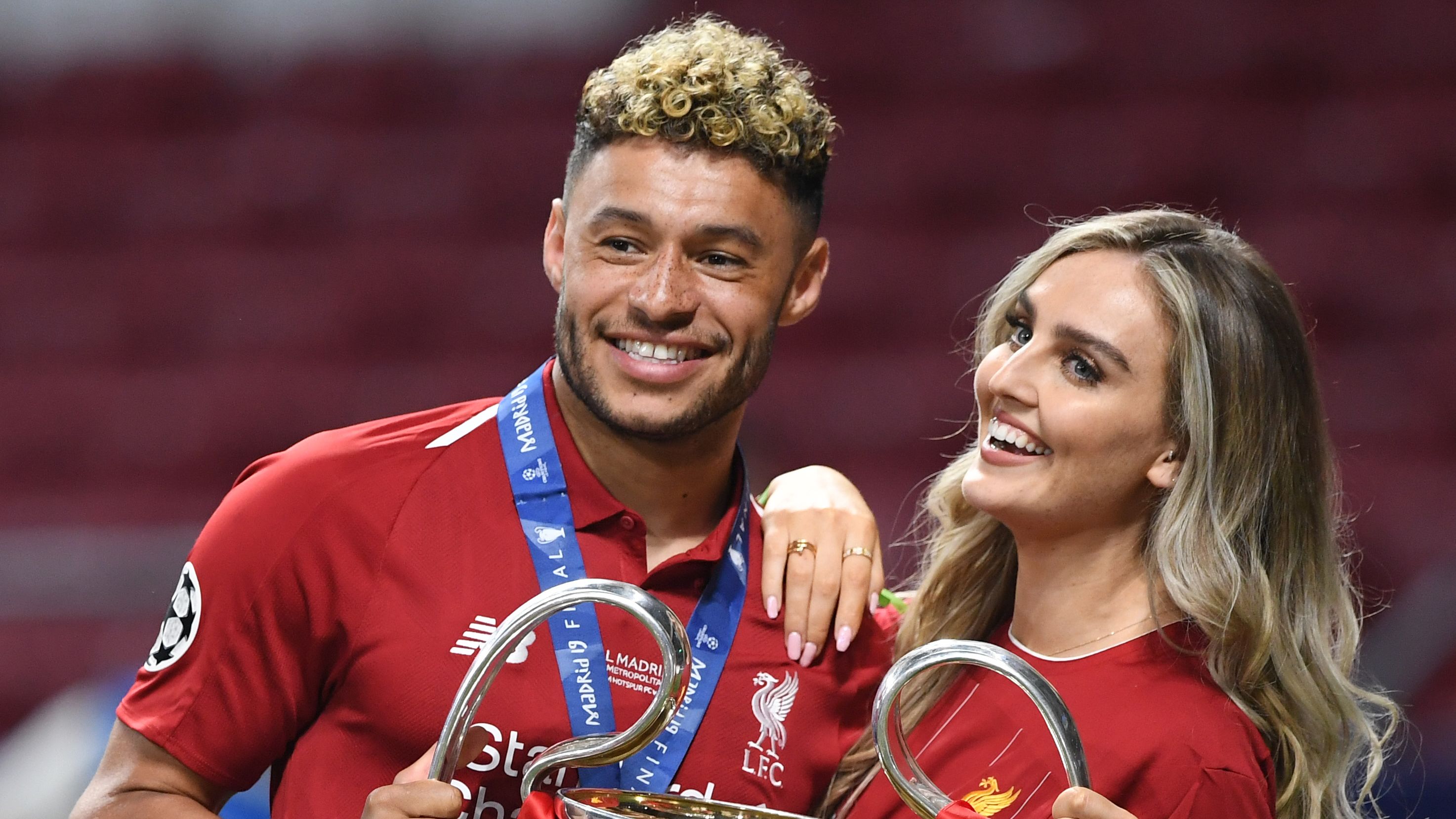 Alex Oxlade-Chamberlain and fiancee Perrie Edwards expecting second child as Little Mix star shows off baby bump