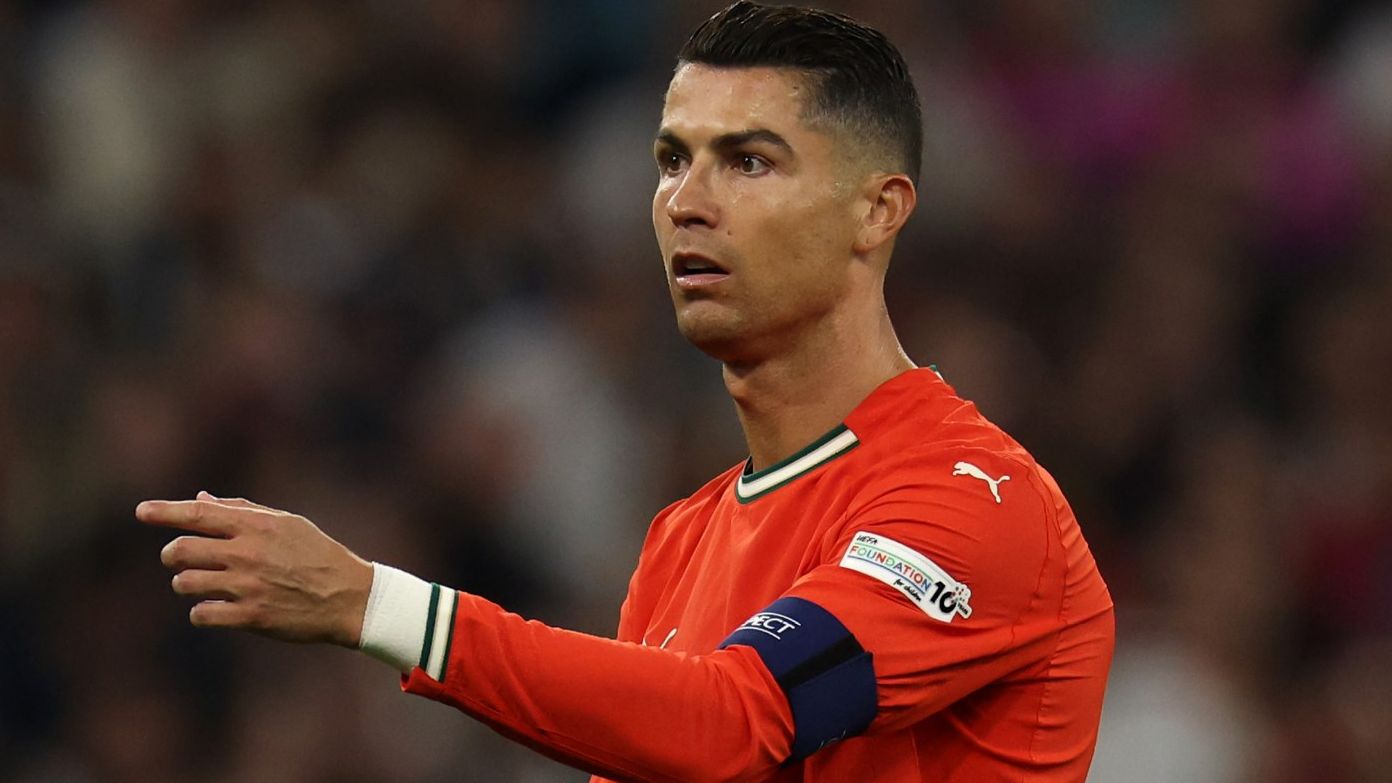 Frustrated Cristiano Ronaldo told fan to 'f*ck off' during hotel selfie incident, claims expert lip-reader - with Portugal star caught shoving Armenia supporter on camera