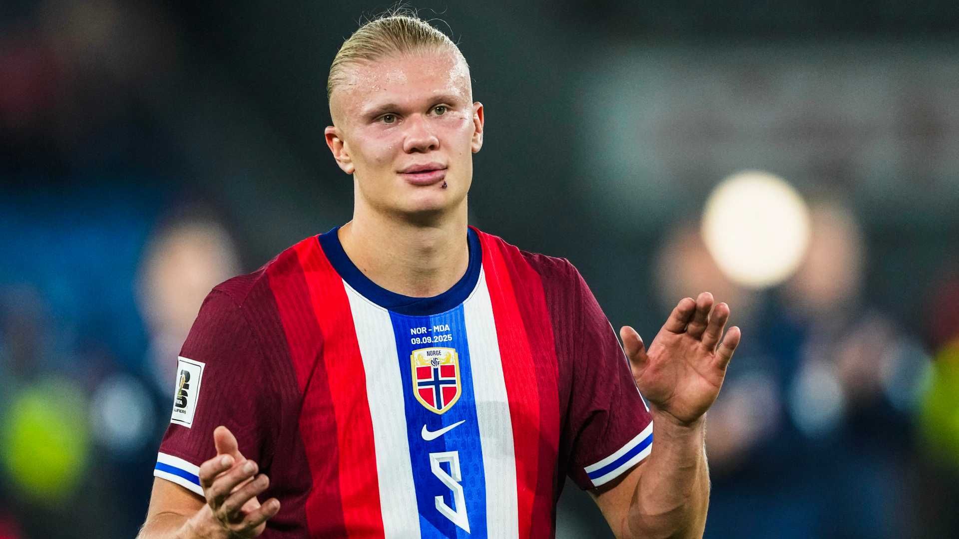 Erling Haaland shows off bizarre personalised calendar featuring Man City star holding a GUN while riding a motorcycle with a mystery woman - as well as internet sensation Hasbulla